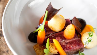 Rubia Gallega rund met crème van wortel en zwarte look